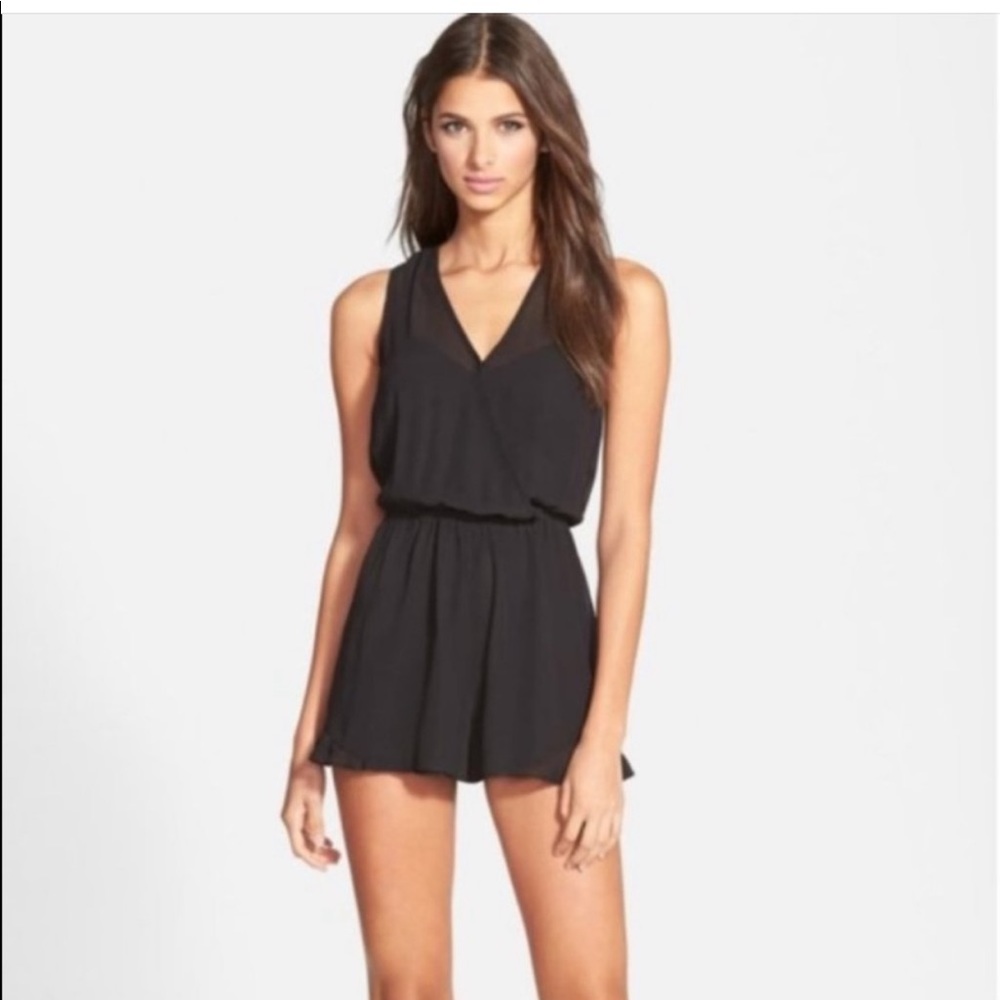 ASTR - black romper with ruffle hem